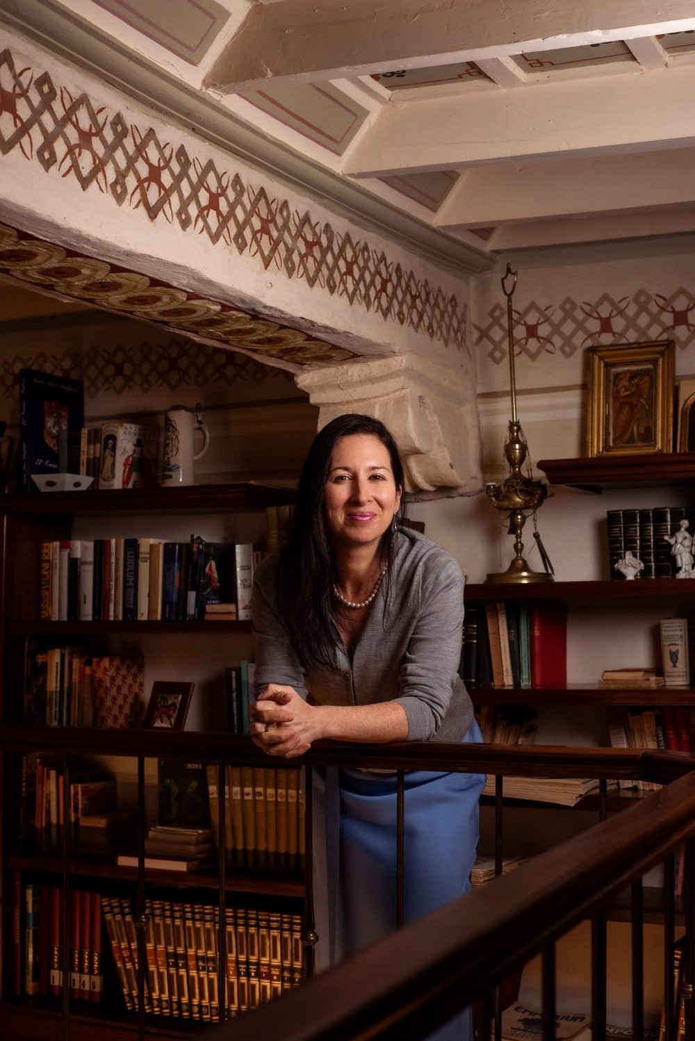 Ellen Misciattelli Bernardini in her library